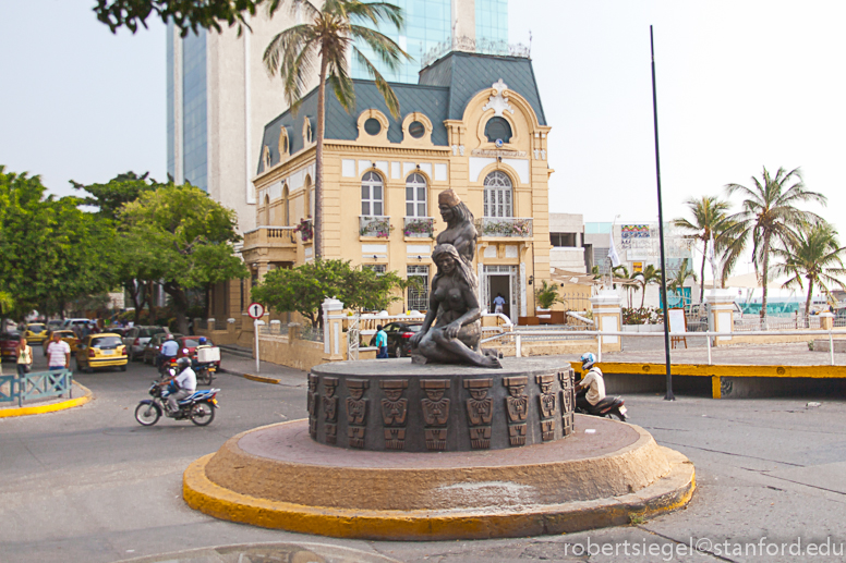 statue - indigenous man and woman